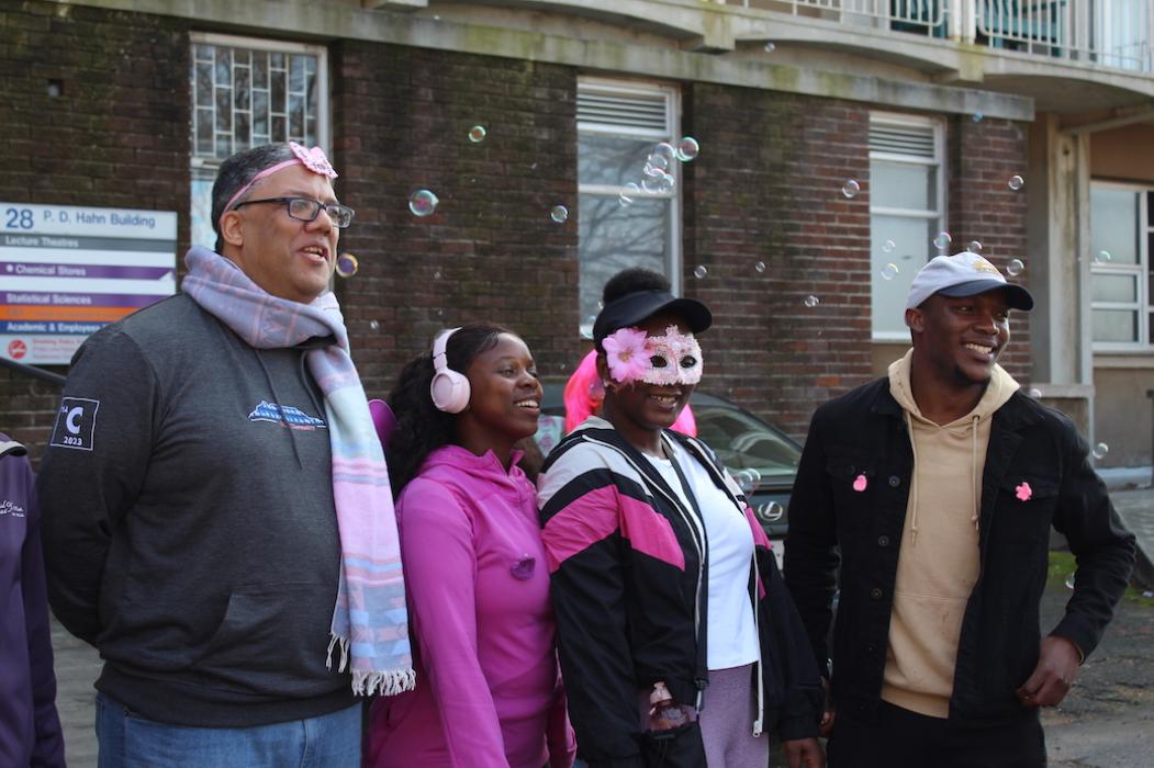 Participants within the Dept of Chemistry all dressed up in their finest pink accessories and eagerly awaiting the start of the walk outside PD Hahn Building.