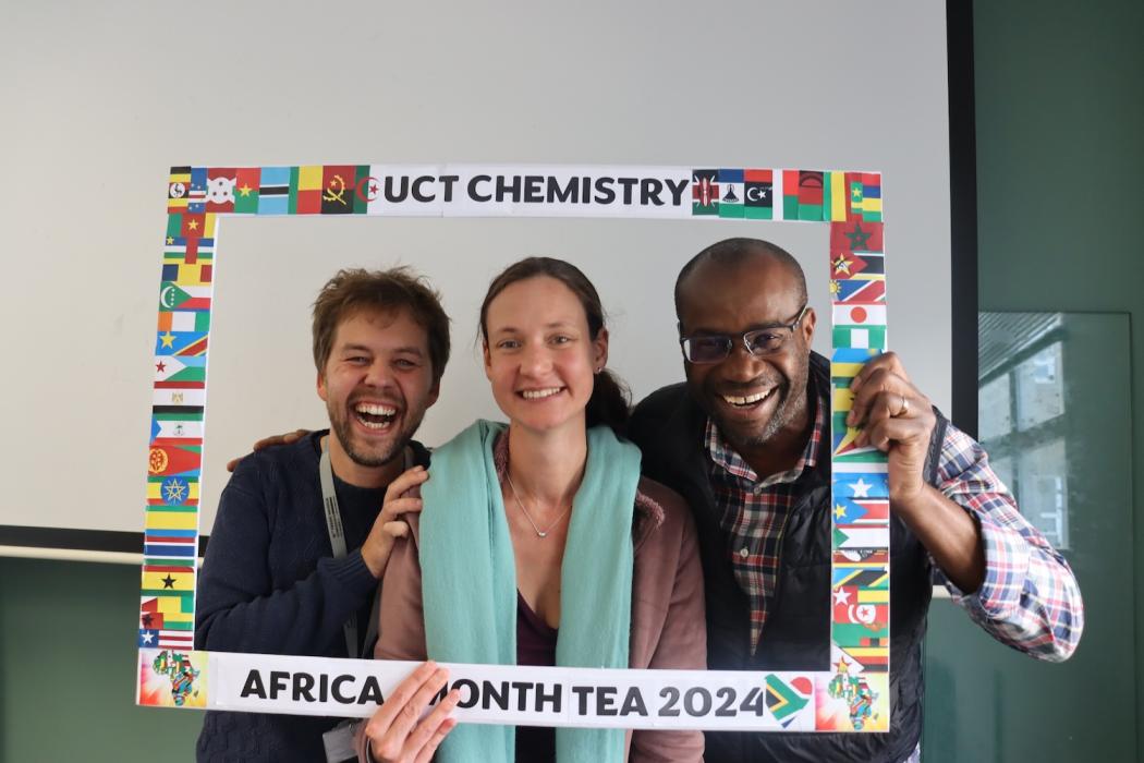 People posing with UCT Chemistry Africa Month Tea 2024 Banner