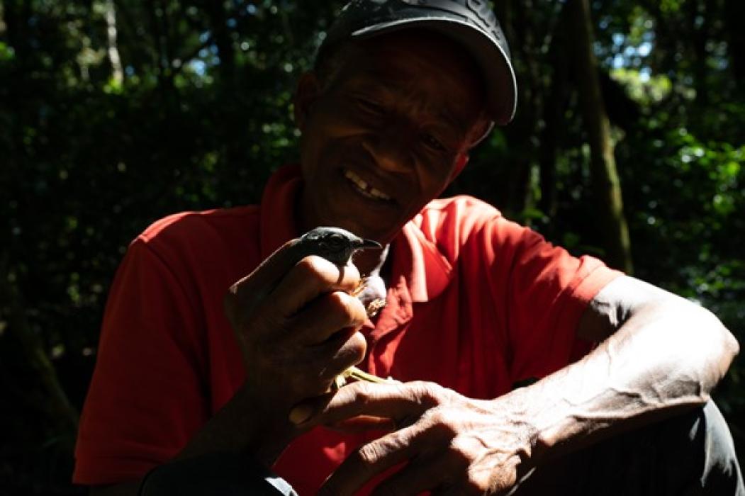 Man holding bird