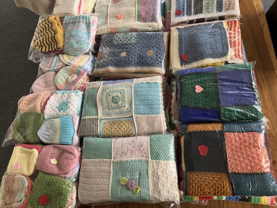 Beautifully knitted goods packaged and placed on table
