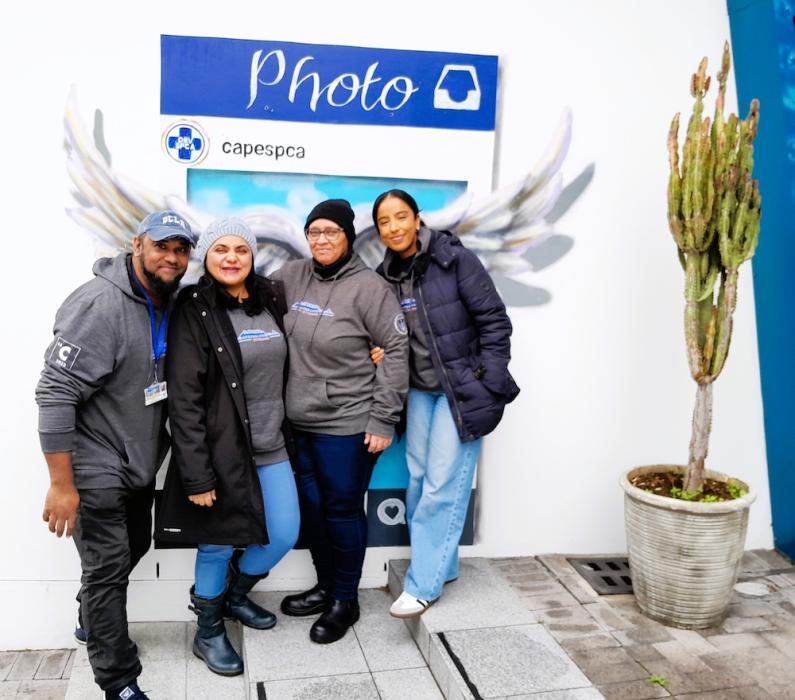 Four chemistry team members outside SPCA drop off point