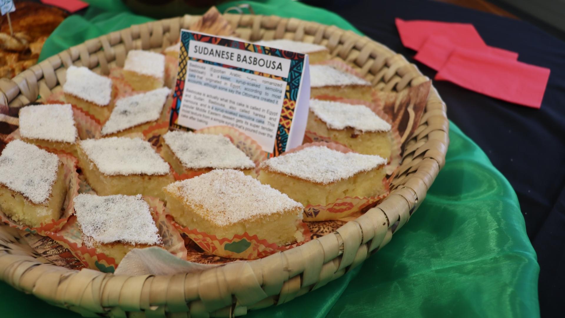 Sudanese cake called Basbousa shaped like cubes and made with what seems to be vanilla and icing on top