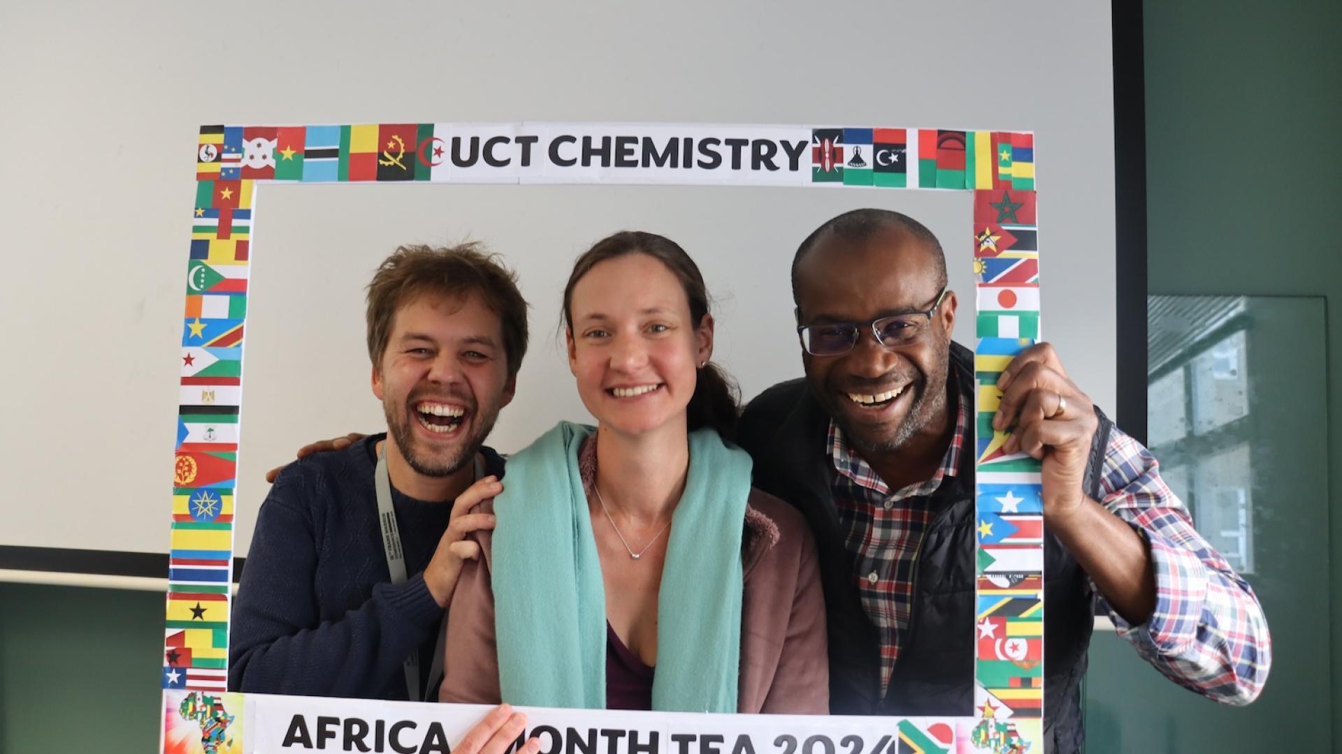 People posing with UCT Chemistry Africa Month Tea 2024 Banner