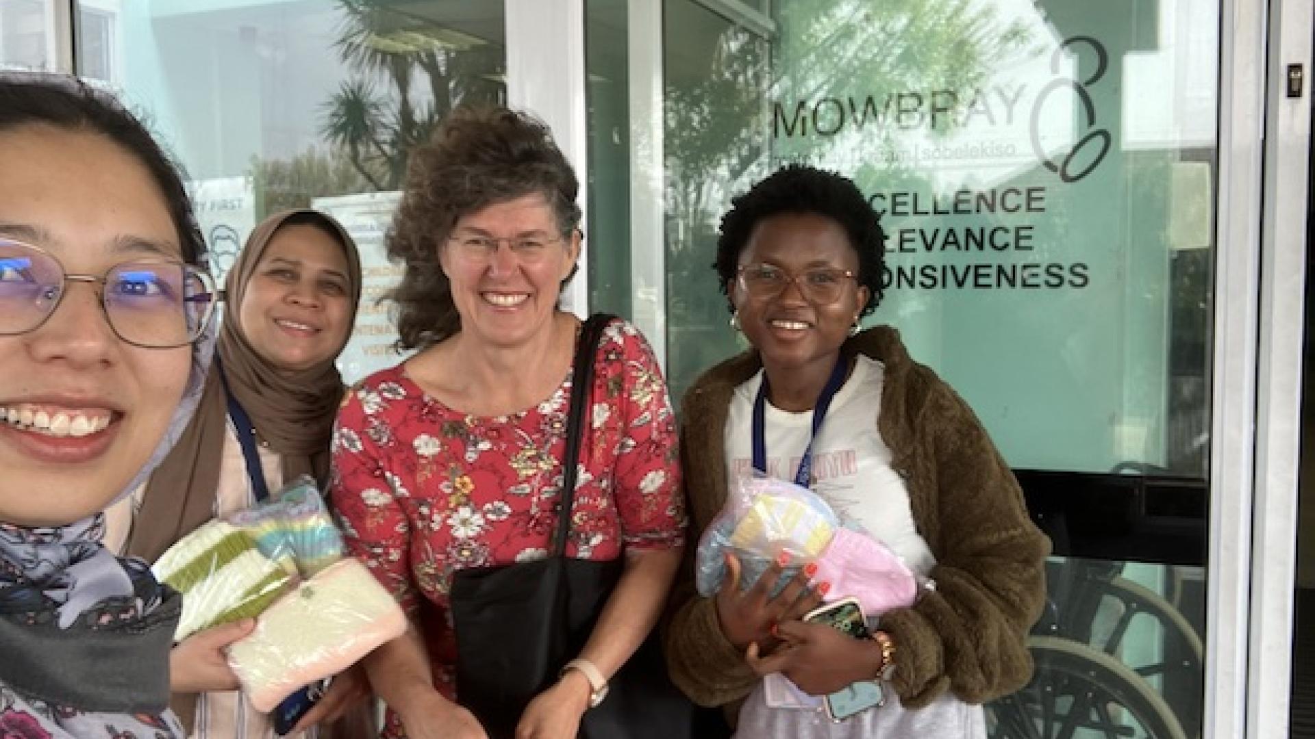 A group of women from the chemistry department standing outside the mowbray maternity clinic