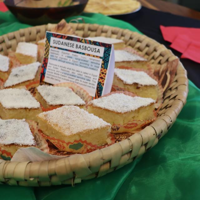 Sudanese cake called Basbousa shaped like cubes and made with what seems to be vanilla and icing on top