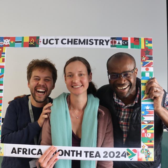 People posing with UCT Chemistry Africa Month Tea 2024 Banner