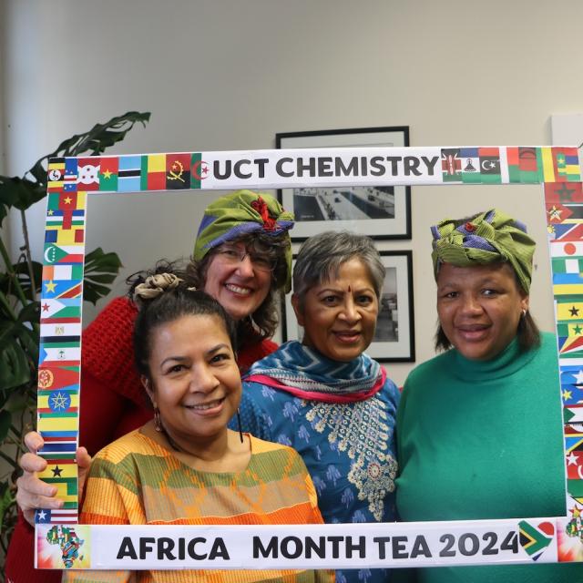 People posing with UCT Chemistry Africa Month Tea 2024 Banner