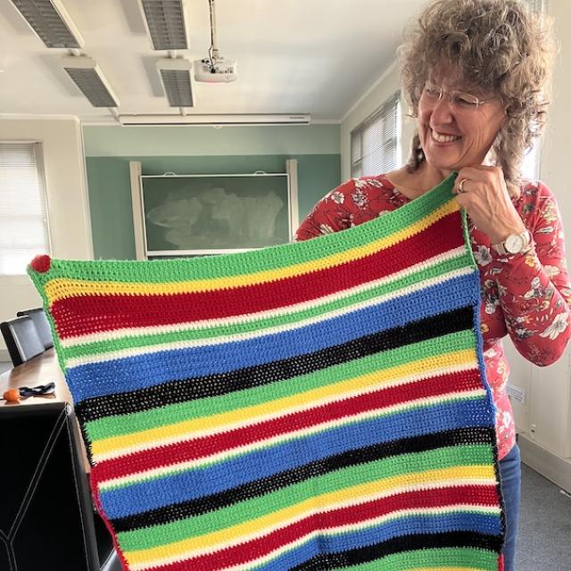 Woman holding a lovely blanket