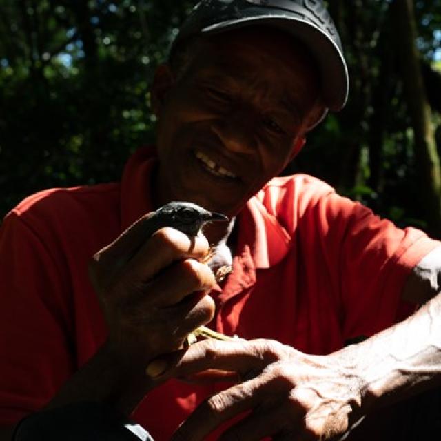 Man holding bird