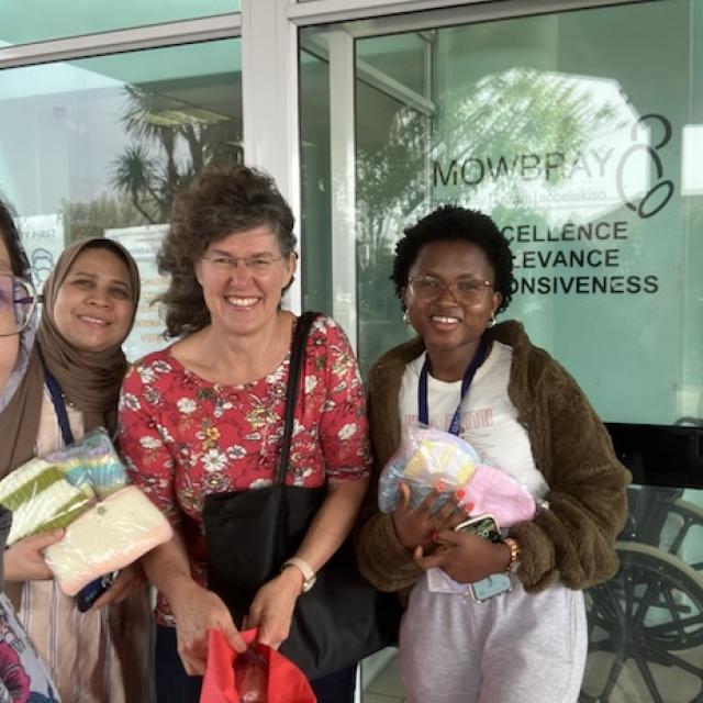 A group of women from the chemistry department standing outside the mowbray maternity clinic