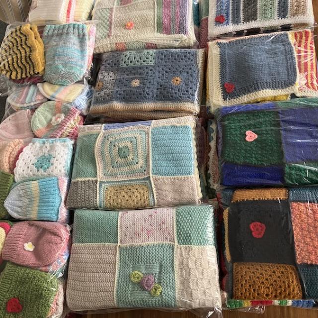 Beautifully knitted goods packaged and placed on table