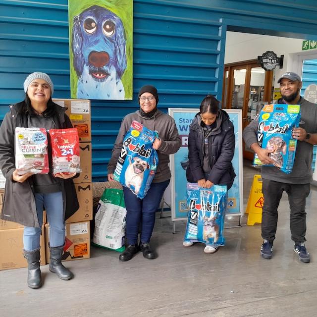 UCT chemistry team holding items they delivered