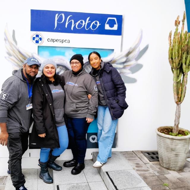 Four chemistry team members outside SPCA drop off point