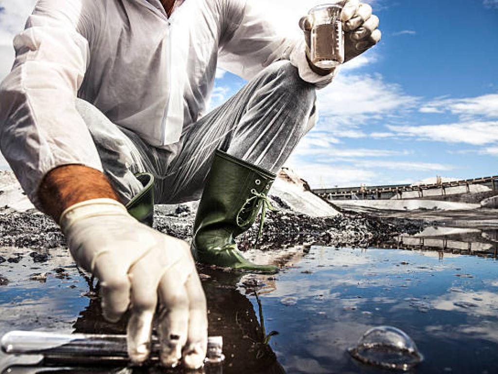 scientist analyze the water of a river