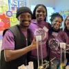 Chemistry postgraduate students at the chemistry exhibition on open day with lots of chemistry demonstrations.
