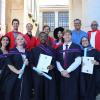 Group of graduants with their supervisions on steps at UCT